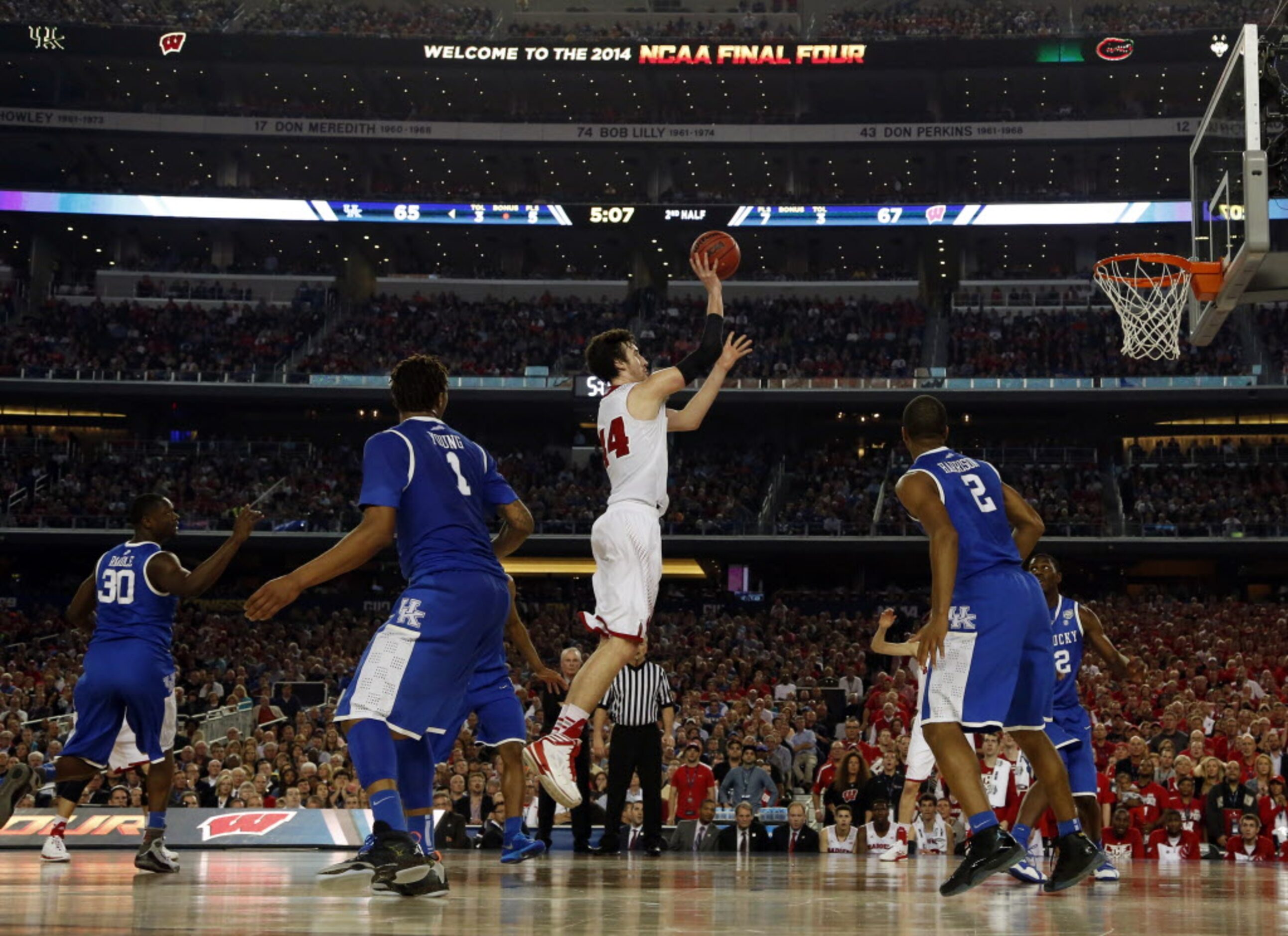 Wisconsin Badgers forward Frank Kaminsky (44) takes a shot during the second half of a...