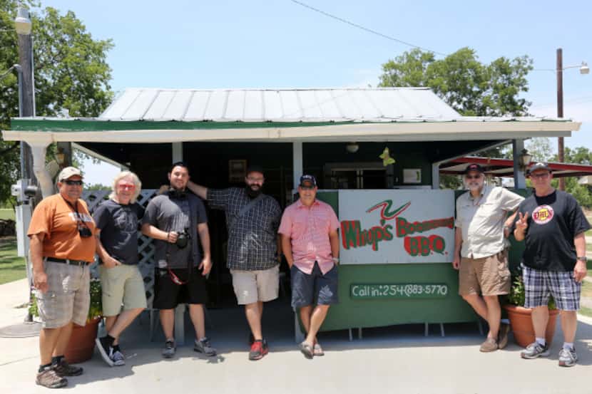 The Posse poses for a group photo outside Whup's Boomerang Barbecue in Marlin during the...