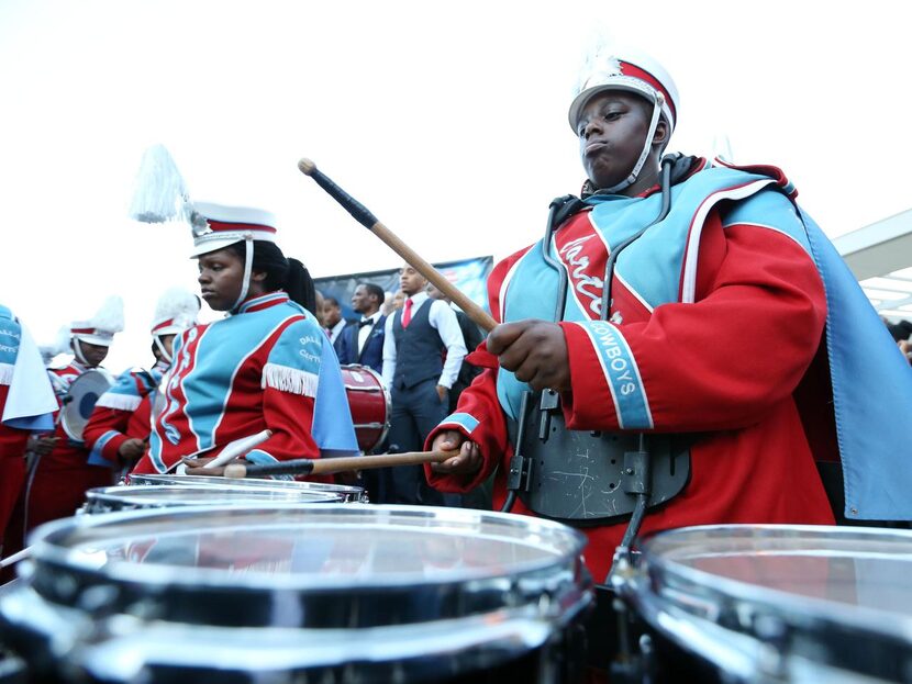 
Carter High band member Jazmine Jones kept the beat going at festivities celebrating the...