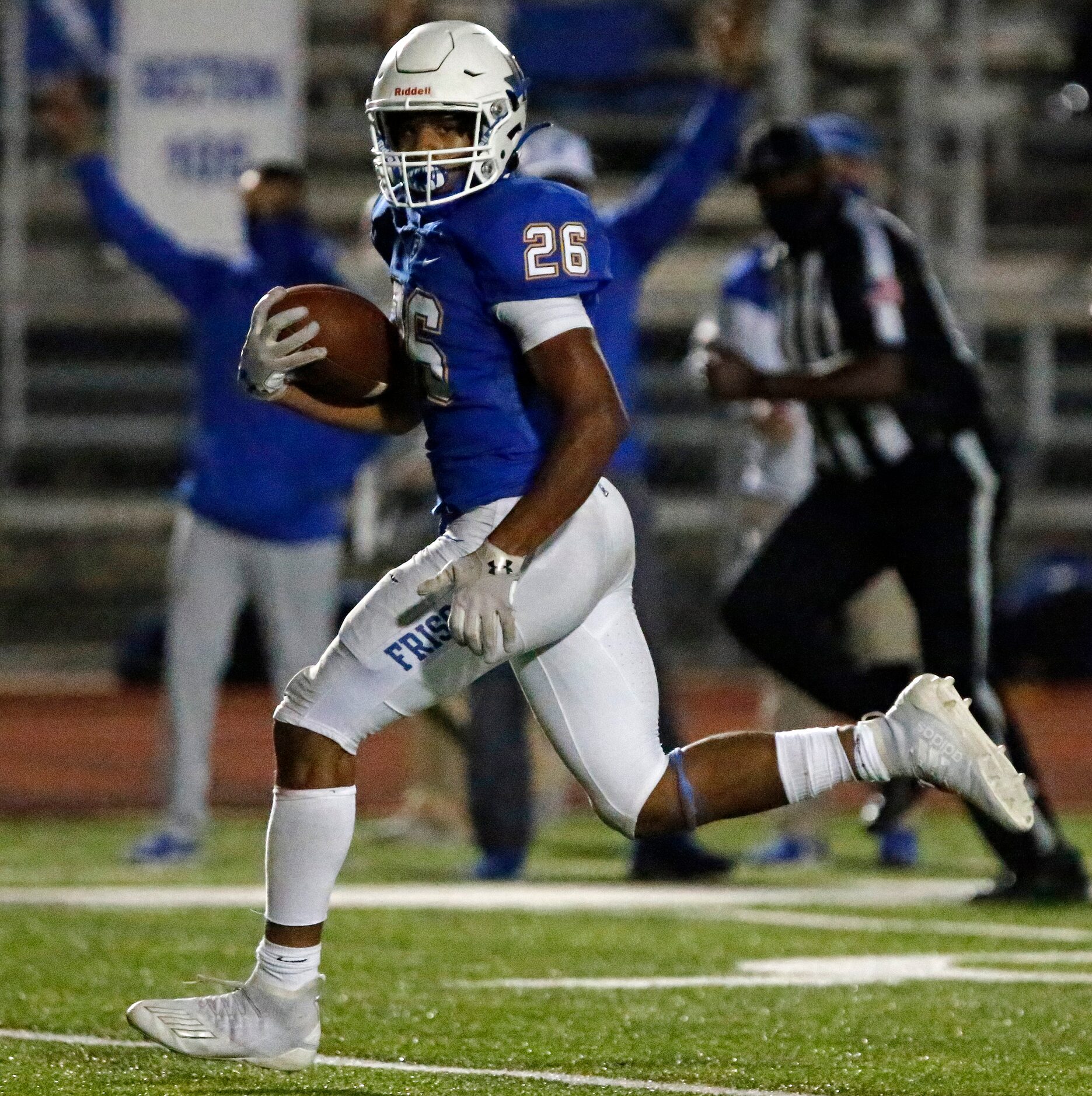 Frisco High School running back Syone Usma-Harper (26) runs for his second touchdown of the...