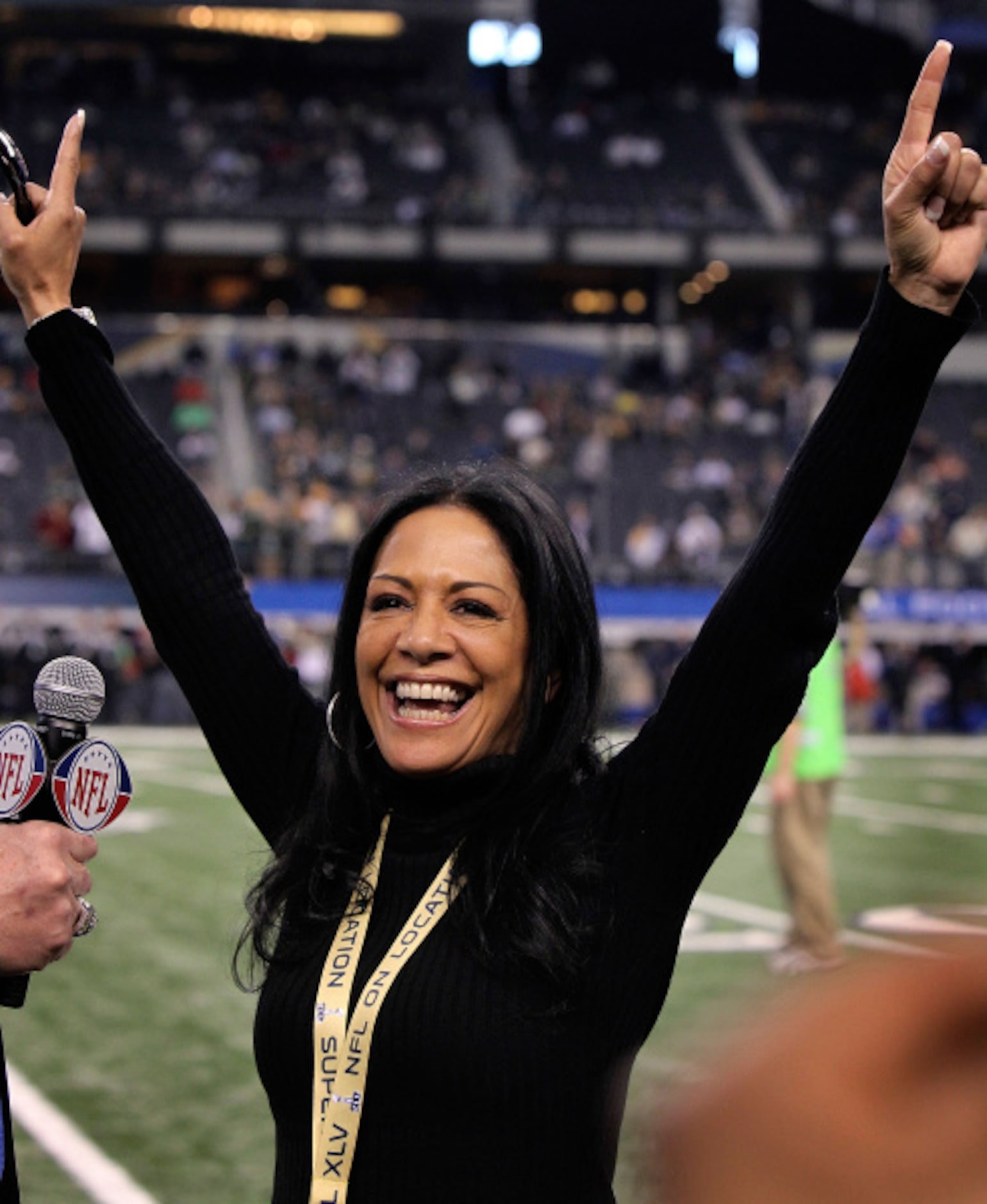 Musician Sheila E smiles as she announces she is a Packers fan before the start of Super...