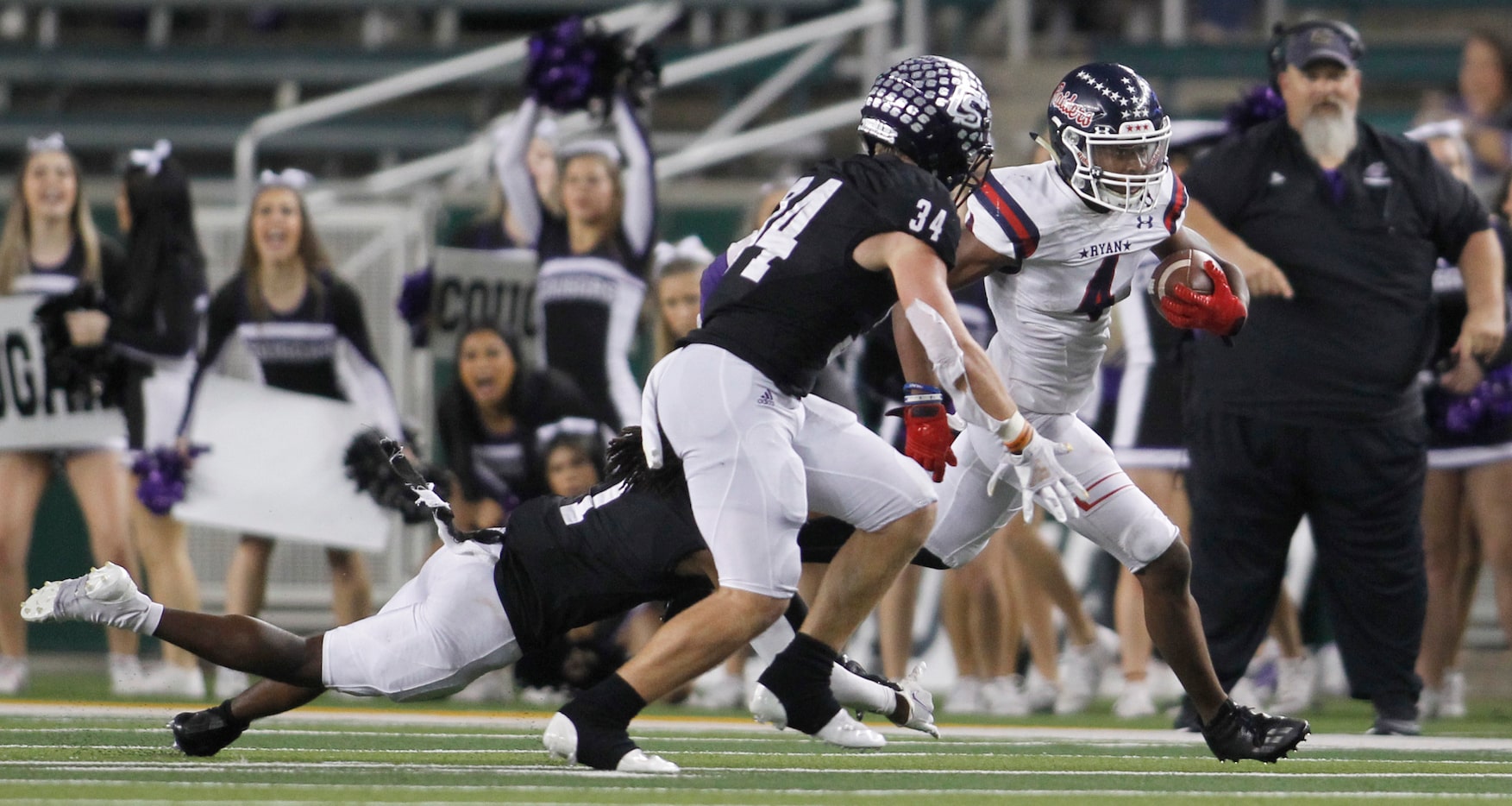 Denton Ryan receiver Jordyn Bailey (4) tacks on yardage after a 4th quarter reception as...