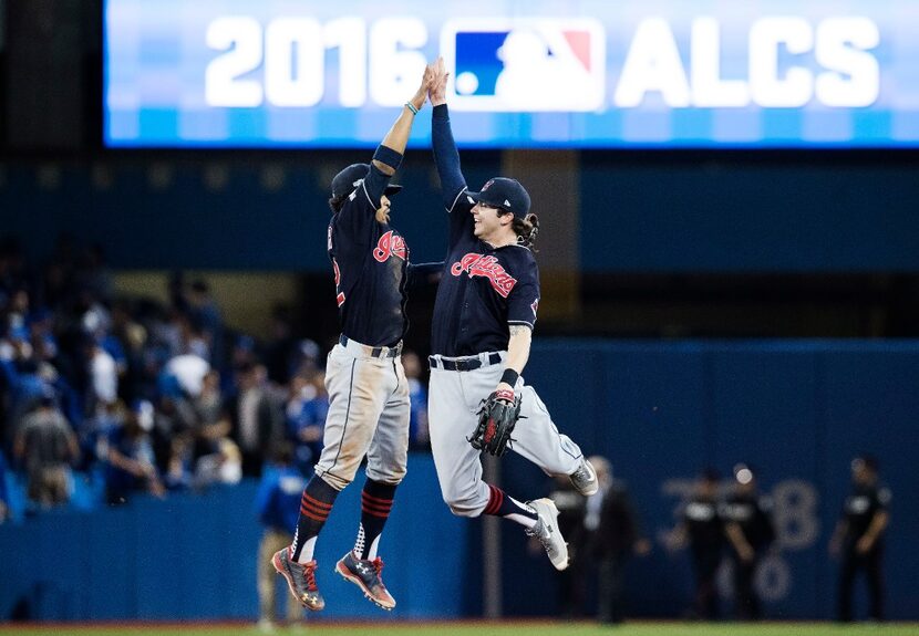 Cleveland Indians shortstop Francisco Lindor, left, and centre fielder Tyler Naquin...