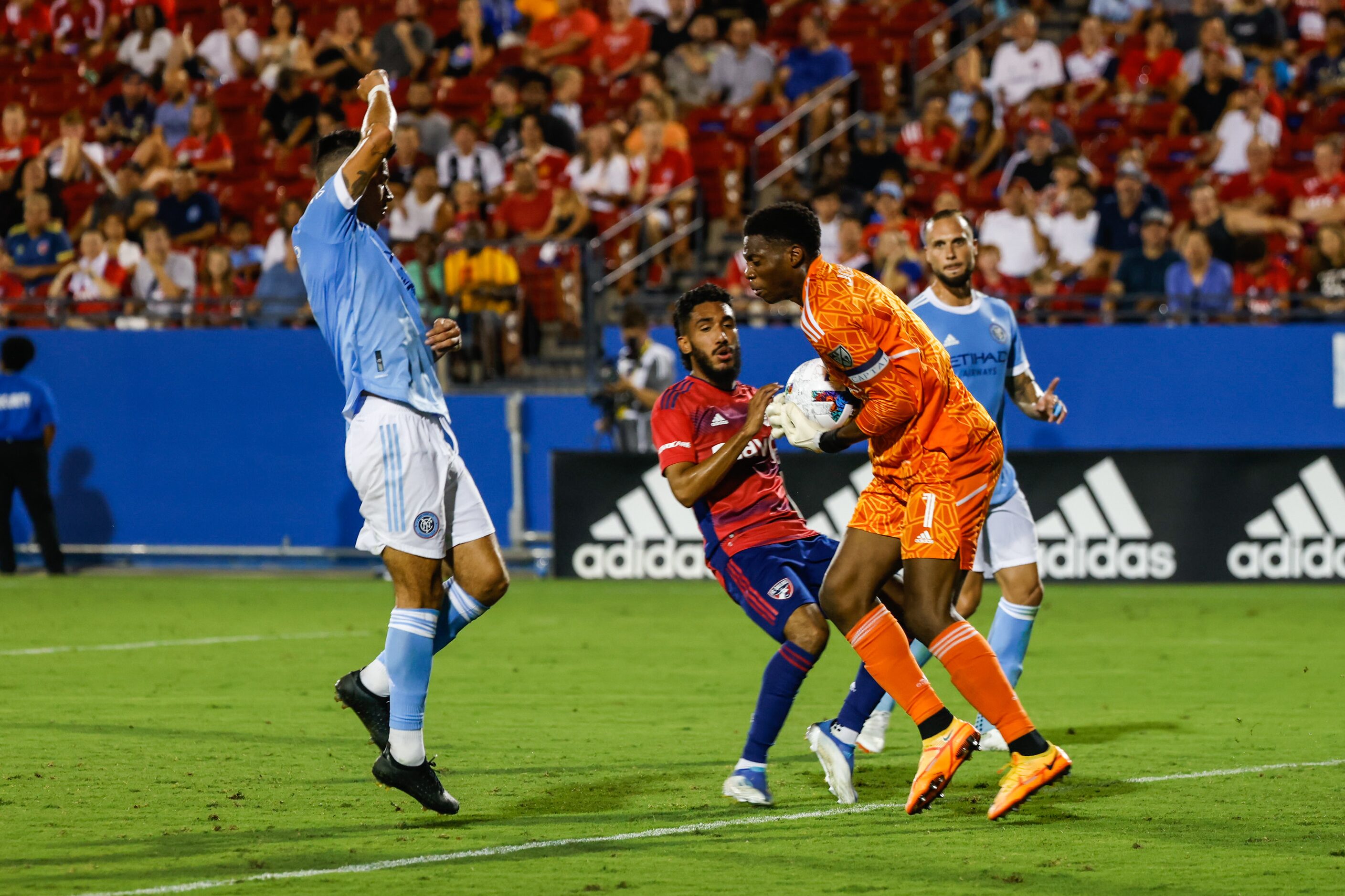 New York City goalkeeper Sean Johnson (1) stops a shot from FC Dallas during the second half...