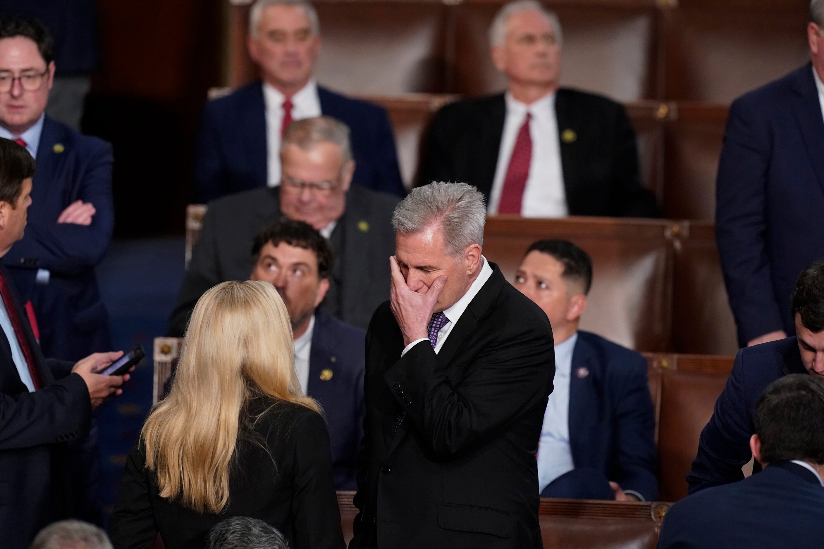 Rep. Kevin McCarthy, R-Calif., talks with Rep. Marjorie Taylor Greene, R-Ga., at the...