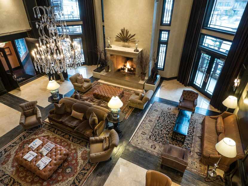 The spacious  lobby of the Waldorf Astoria Park City is fronted by a 300-year-old fireplace...