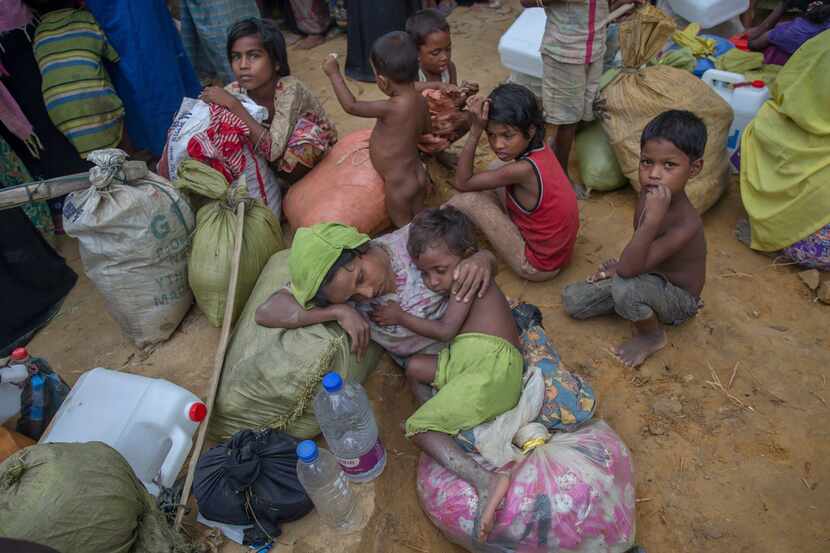 Rohingya Muslim woman Saman Bahar, who spent four days in the open after crossing over from...