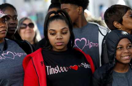 Trinity Lewis (center), mother of Tinslee Lewis, attended a news conference Jan. 6 outside...