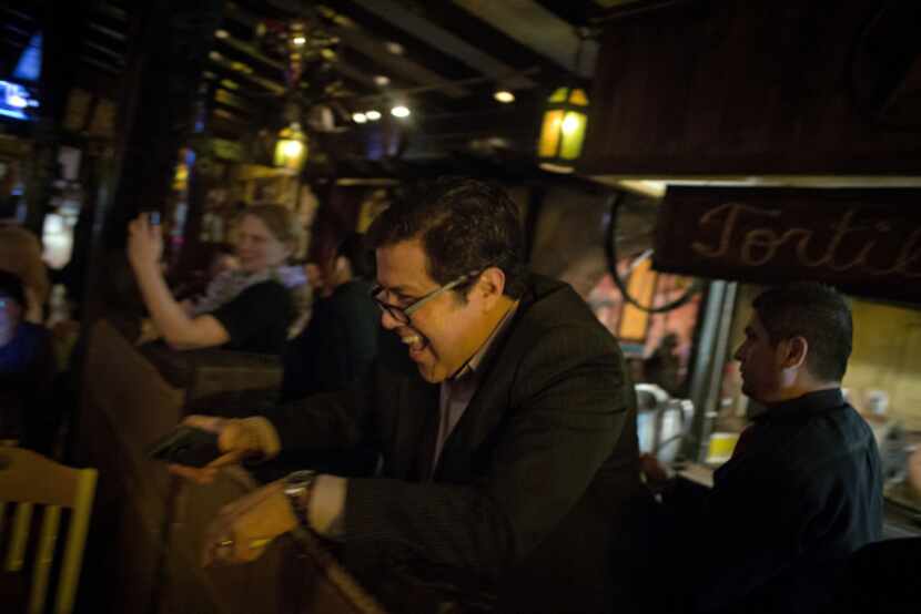 Juan Sanchez, manager of El Ranchito, laughed as he watched a performance by Elvis Presley...