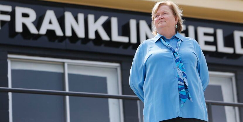 
Anne Franklin, wife of the late Rusty Franklin, stands and looks out onto the baseball...