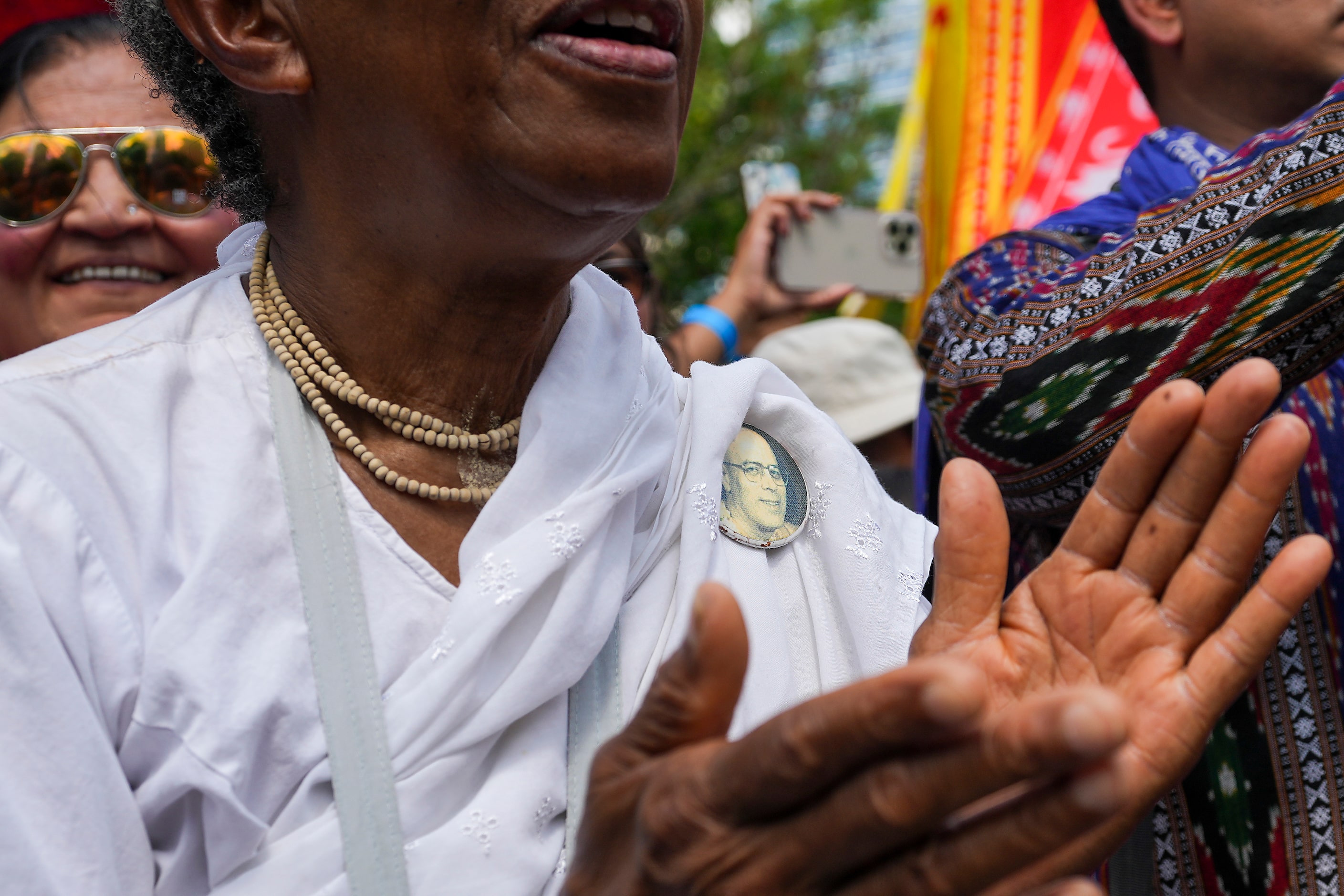 People cheer as dancers perform during the Festival of Joy on Saturday, April 15, 2023, in...