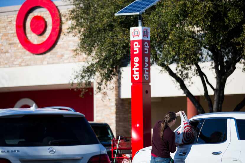 Customers pick up online orders from the Medallion Center Target.