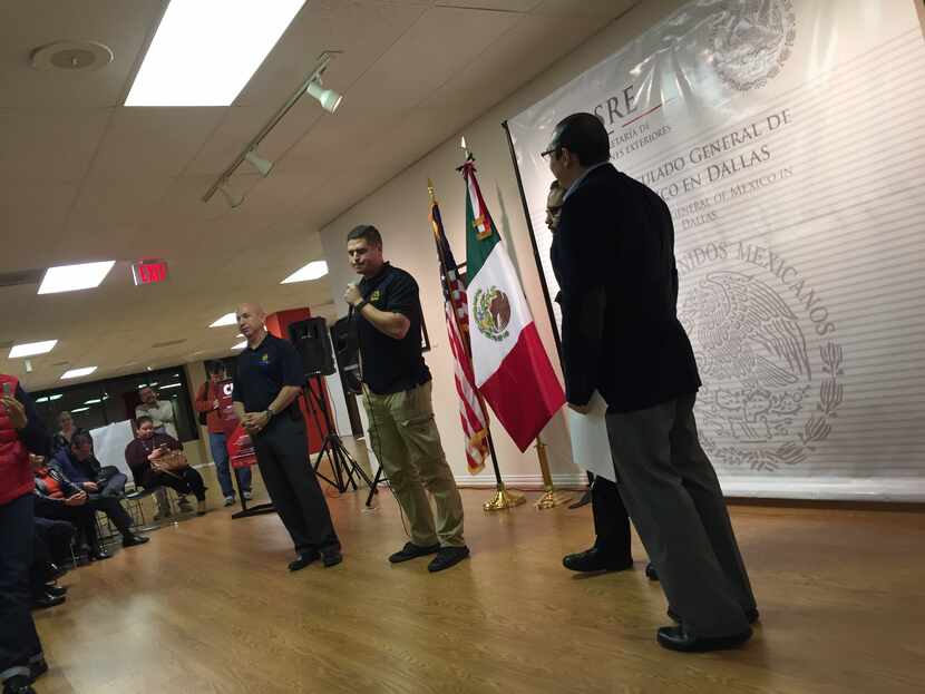 Dallas police officers address crowd at Mexican consulate, assuring them they are not...