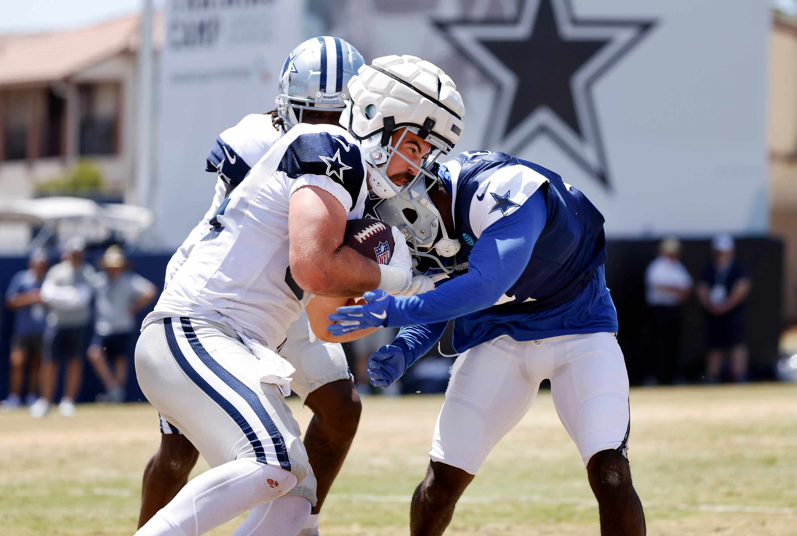 Dallas Cowboys tight end Sean McKeon (84) is tackled by cornerback Jourdan Lewis (2) after...