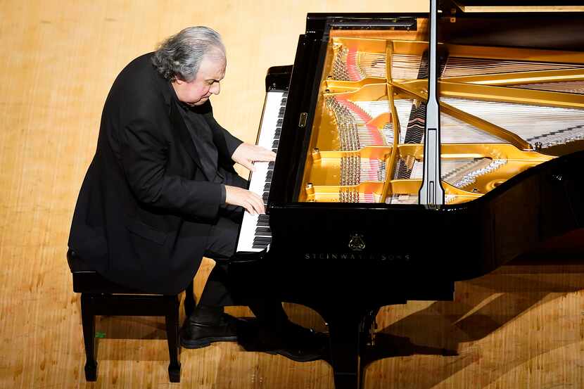 Pianist Yefim Bronfman performs during the season-opening Dallas Symphony concert at the...
