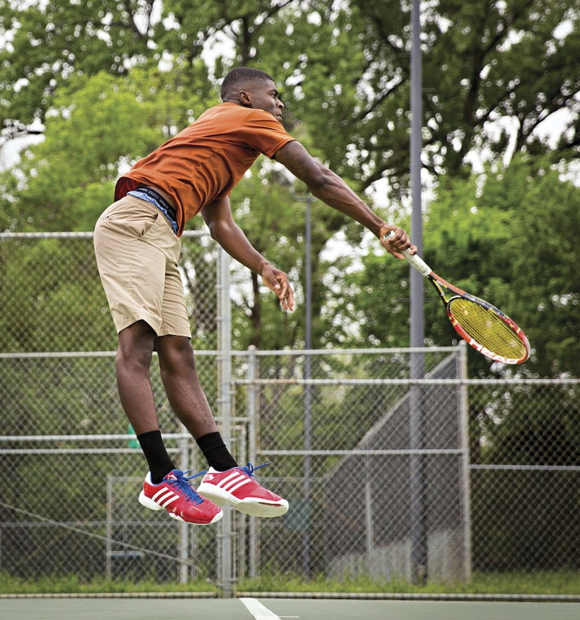 Julian McClaine serves during a match at the Fair Oaks Tennis Center.