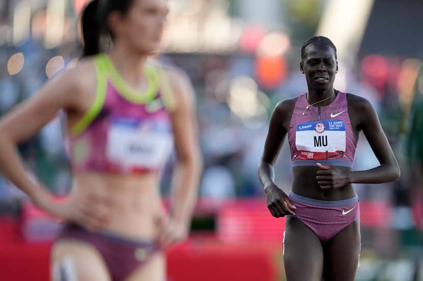 Athing Mu is in last place after falling in the women's 800-meter final during the U.S....