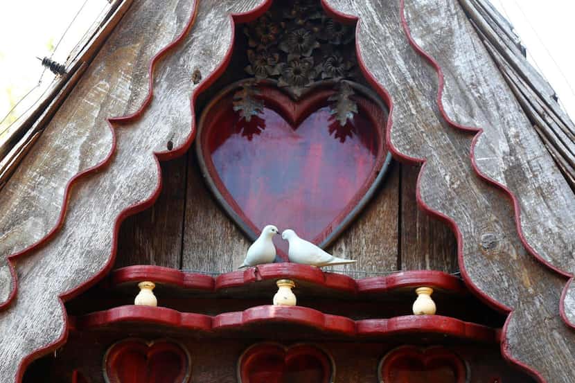 Wooden doves  grace the Lakewood home dubbed the Swan House.