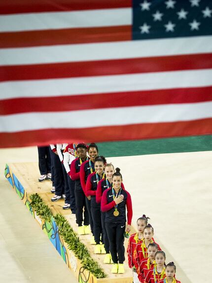 The USA gymnastics team after they won the gold medal in the women's team gymnastics final...