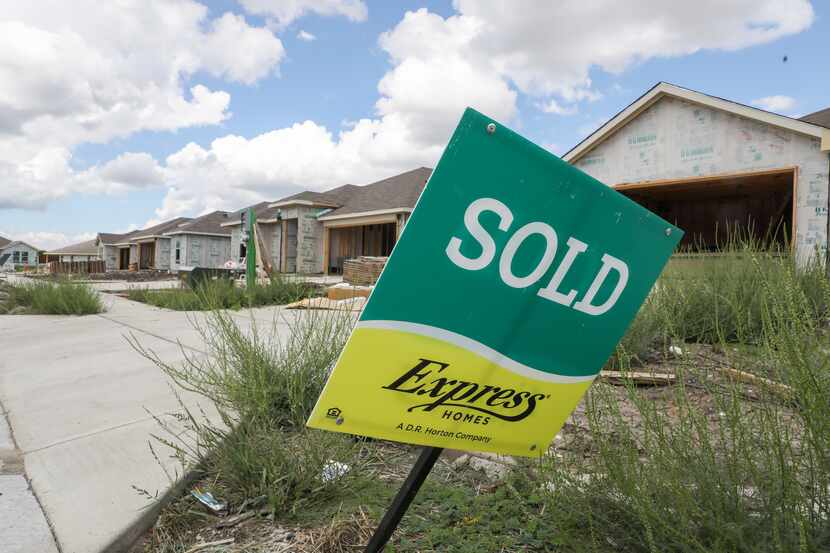 Homes are marked as sold in the Magnolia housing development in Josephine on Friday, Aug....