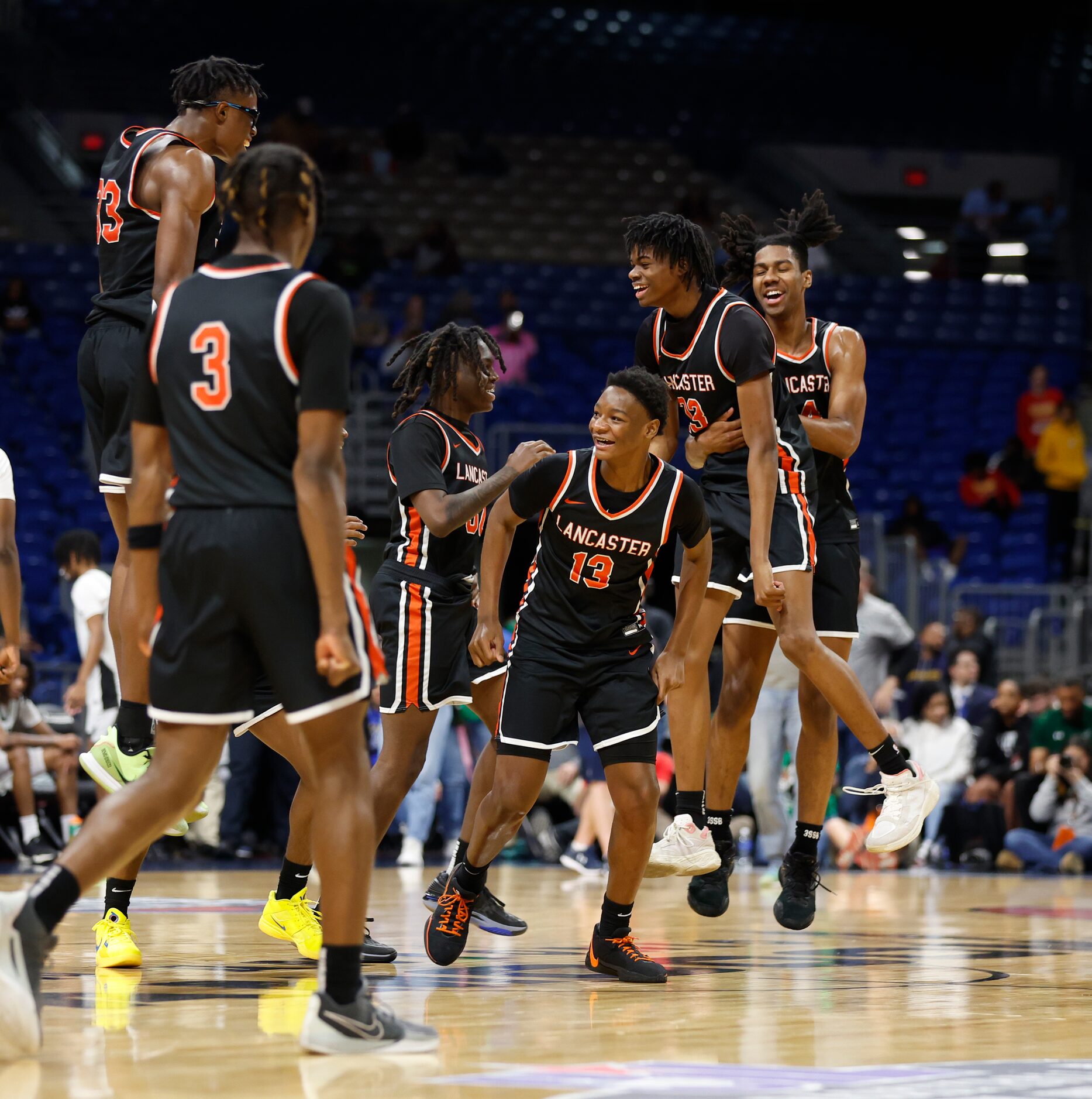 Lancaster celebrates its victory over Killeen Ellison in the UIL Class 5A boys basketball...