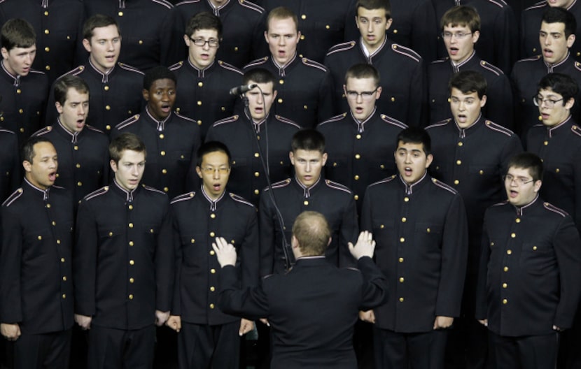 A choir sings during a memorial service for Chris Kyle at Cowboys Stadium in Arlington on...