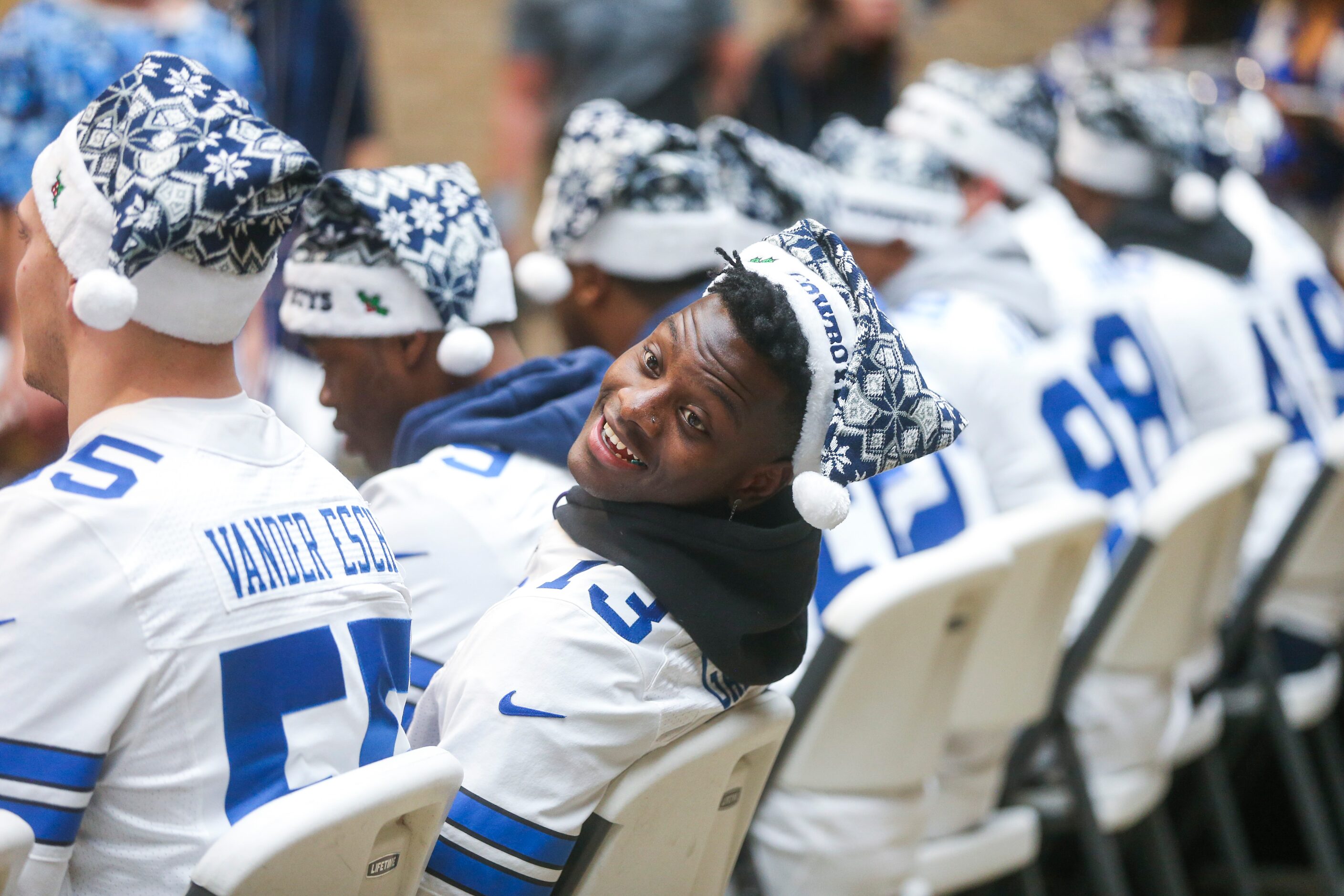 Dallas Cowboys wide receiver Michael Gallup chats with a teammate during the teamâs annual...