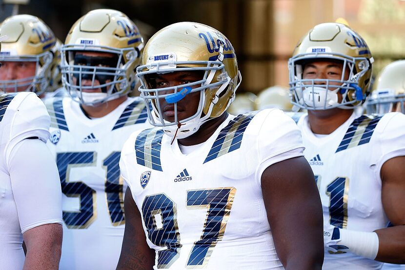 TUCSON, AZ - SEPTEMBER 26:  Defensive lineman Kenny Clark #97 of the UCLA Bruins prepares to...