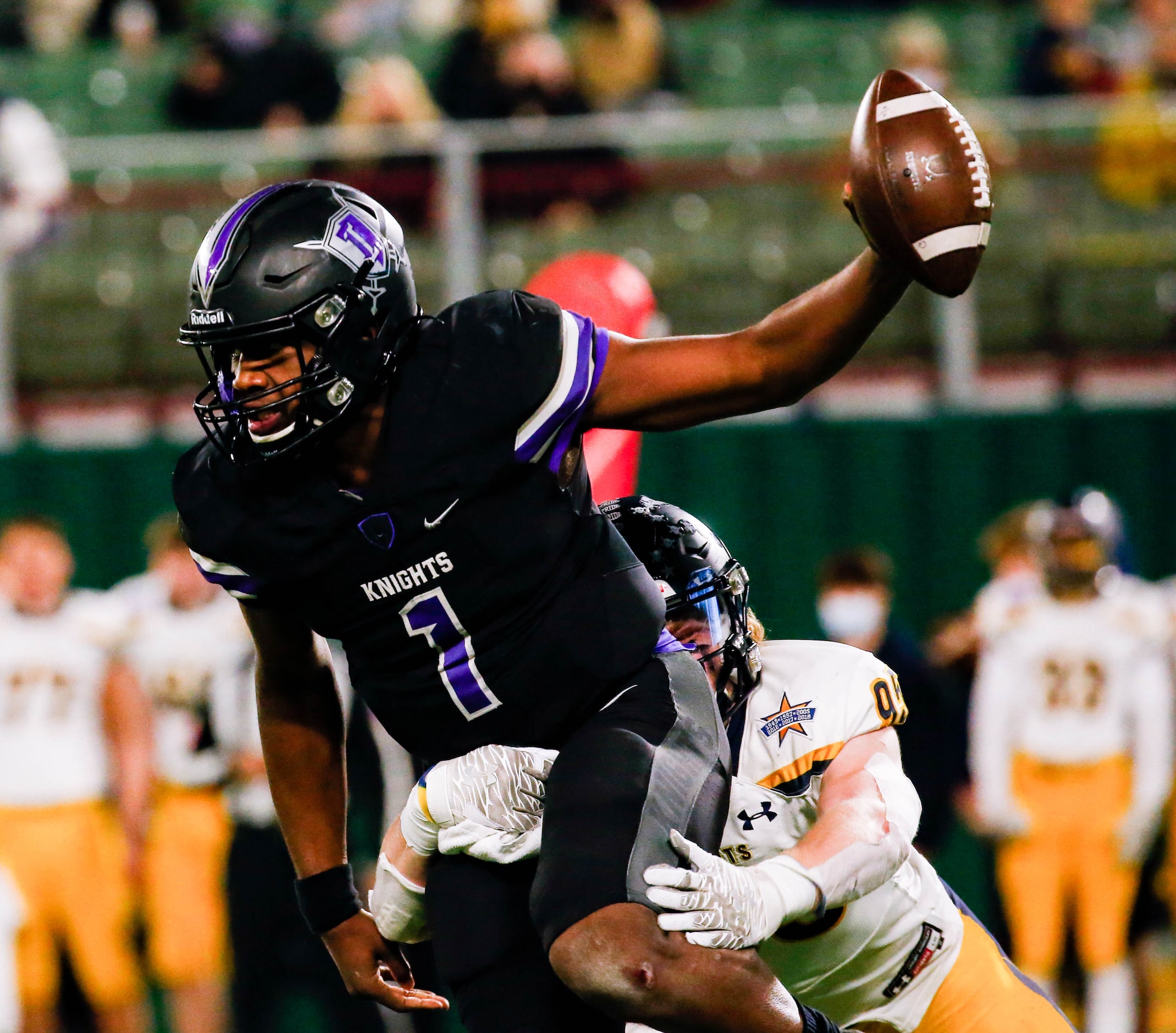 Highland Park's Jack Curtis (95) sacks Frisco Independence's Braylon Braxton (1) during the...