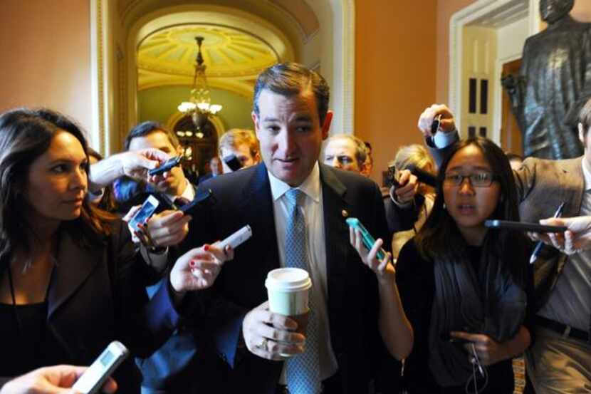 
US Senator Ted Cruz, R-Texas, is flanked by journalists as he arrives for a meeting at the...