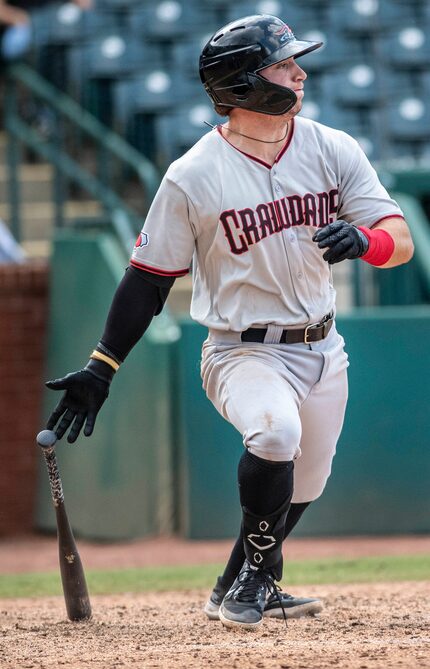 Hickory Crawdad's Trevor Hauver (33)watches the ball during the game with the Greensboro...