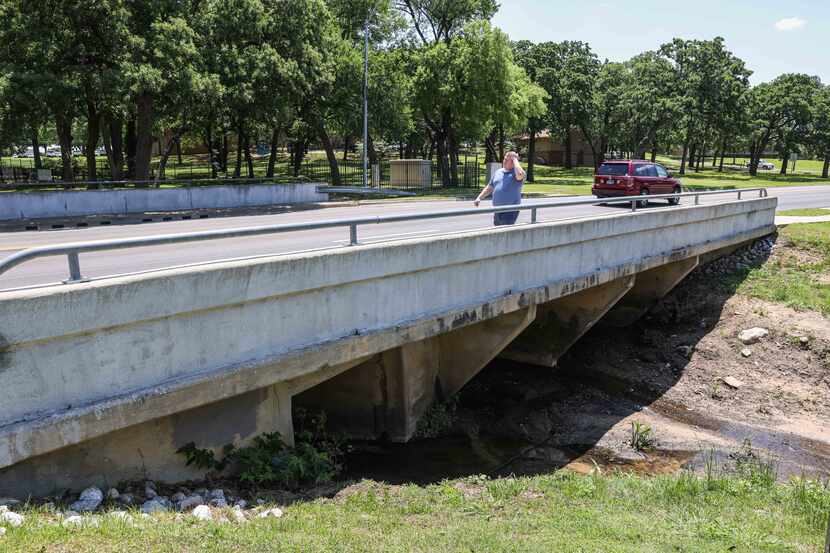 A drainage culvert under a small bridge around the 2100 block near The Arbors Apartments on...