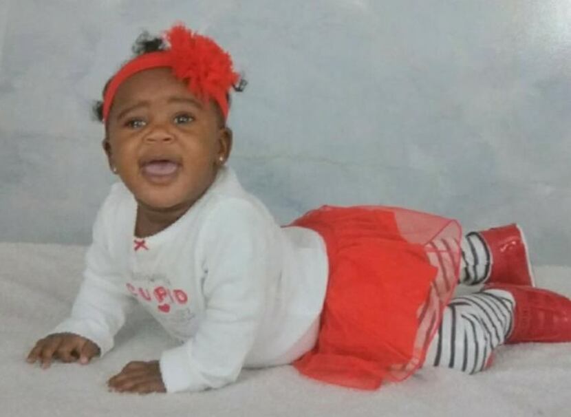 Kirsten McGregor, 1, was saved from an apartment fire when her mother, Shuntara Thomas,...