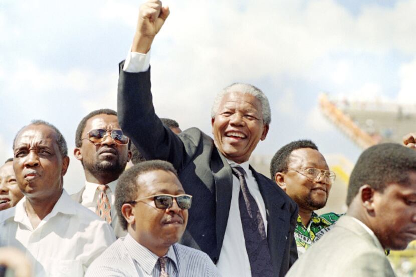 A clenched fist and a charismatic smile were hallmarks of Nelson Mandela, South Africa's...