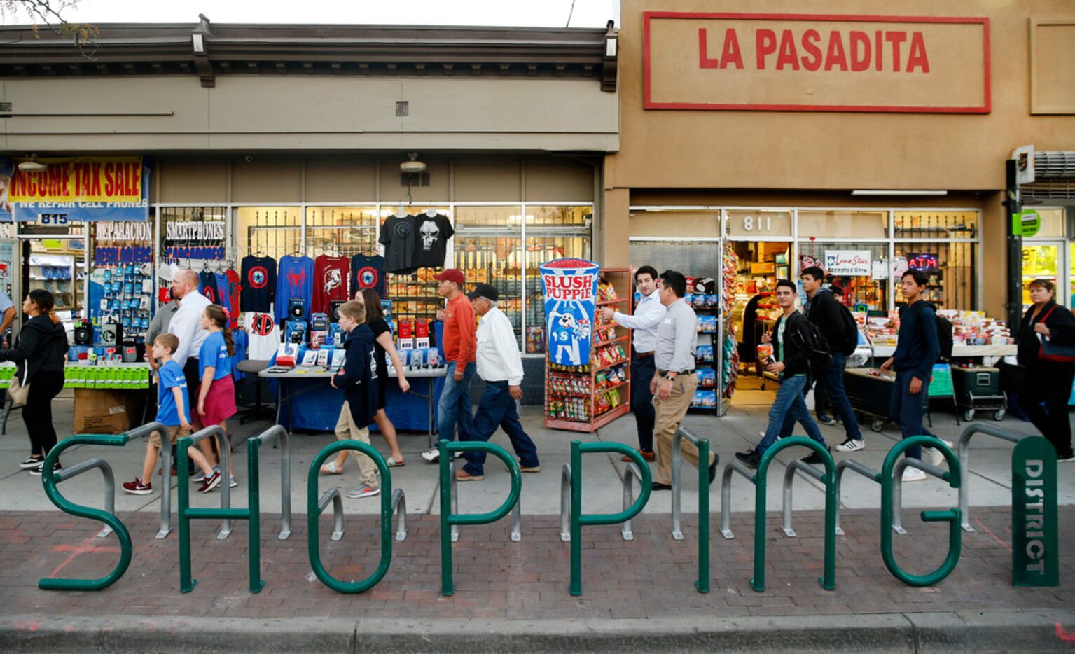 People gathered to celebrate the lighting of South El Paso Street during the Paseo de Las...
