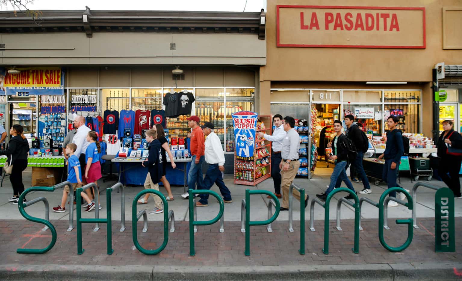 People gathered to celebrate the lighting of South El Paso Street during the Paseo de Las...