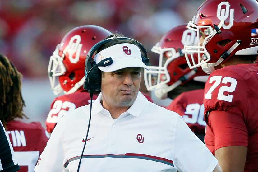 FILE - In this Sept. 10, 2016, file photo, Oklahoma head coach Bob Stoops watches from the...