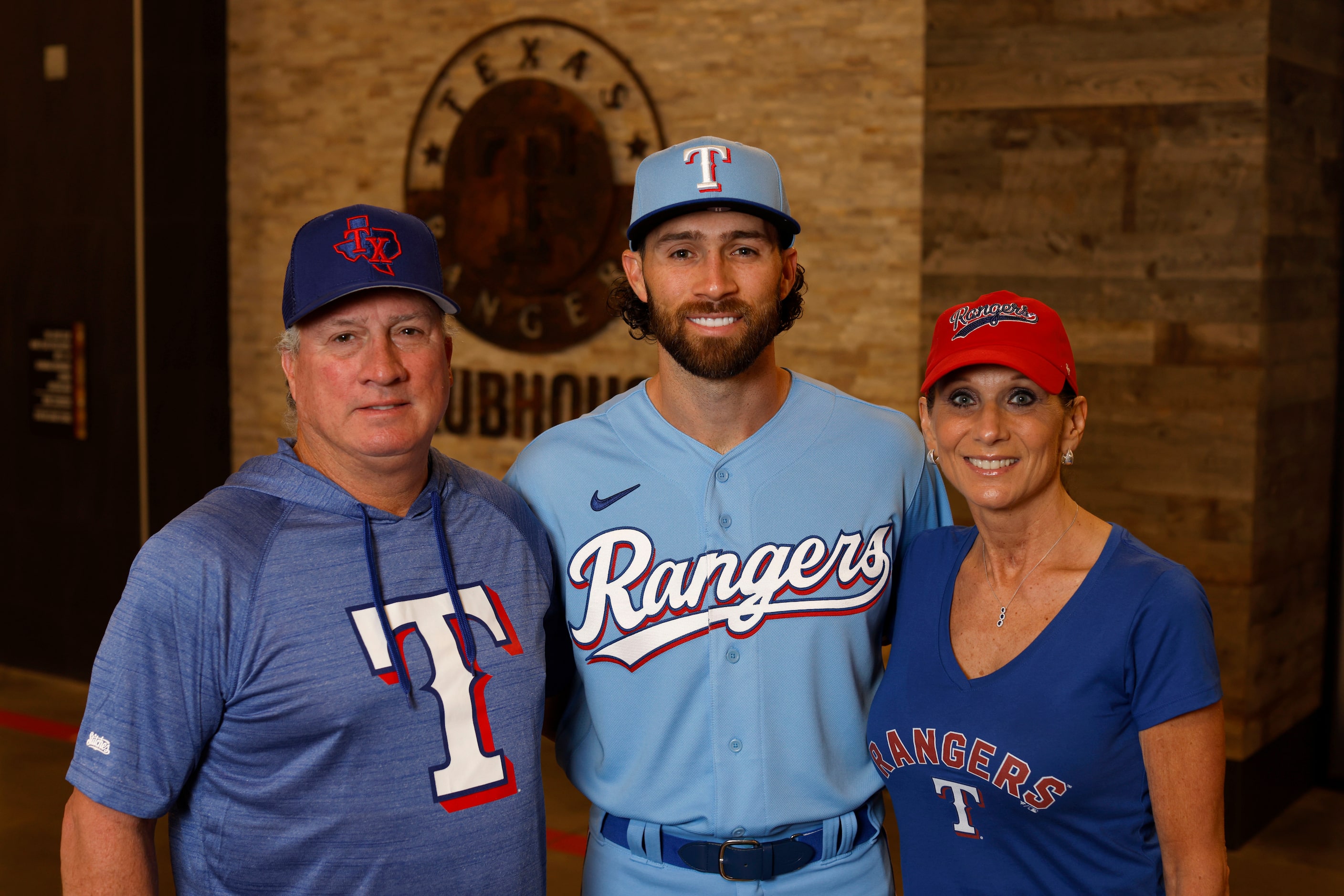 Texas Rangers player Charlie Culberson with his father, Charles Culverson, left, and mother,...