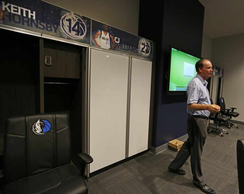 George Killebrew explains how the locker room is equipped with sliding white boards during a...