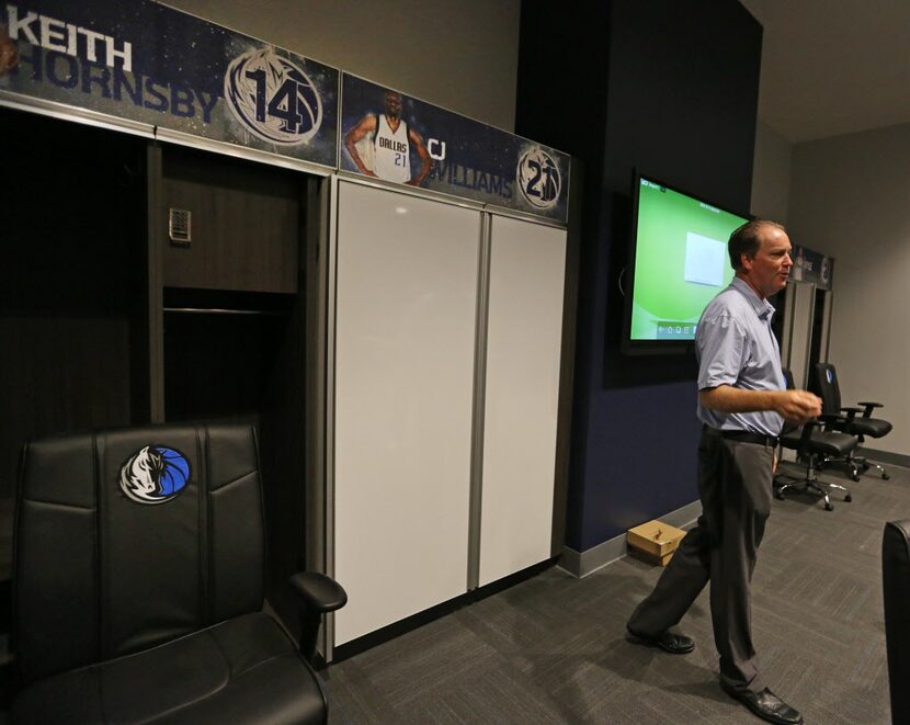 George Killebrew explains how the locker room is equipped with sliding white boards during a...