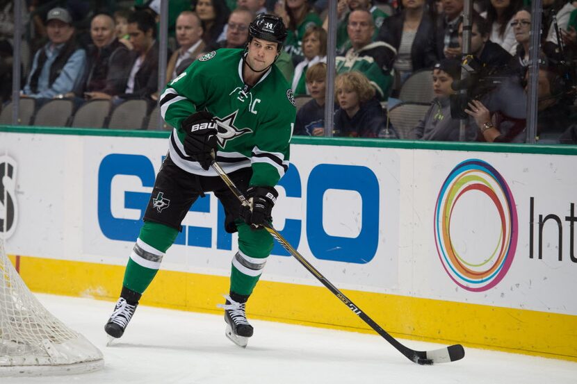 Feb 21, 2015; Dallas, TX, USA; Dallas Stars left wing Jamie Benn (14) skates with the puck...