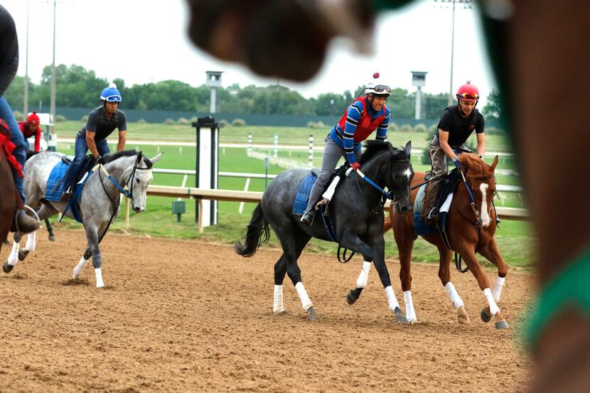 Horse exercisers and jockeys worked out their horses on April 17 at Lone Star Park in Grand...