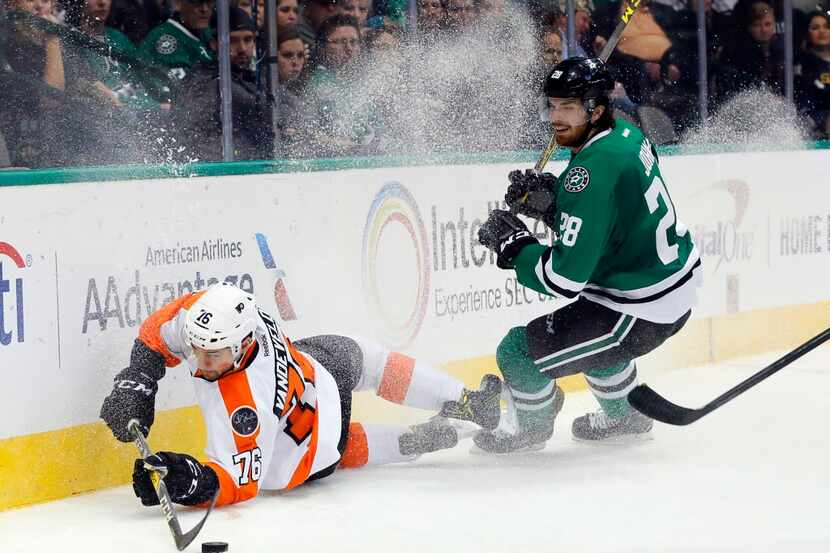 Philadelphia Flyers' Chris VandeVelde (76) reaches out attempting to clear the puck from the...
