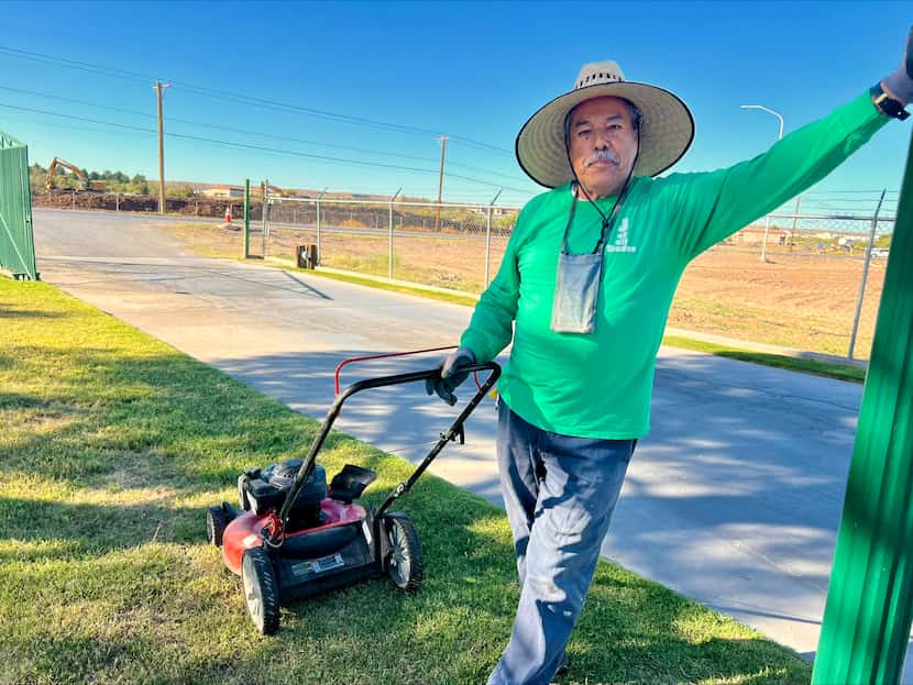 Natividad Pasillas, 74, takes a break from cutting grass in Sunland Park, N.M
