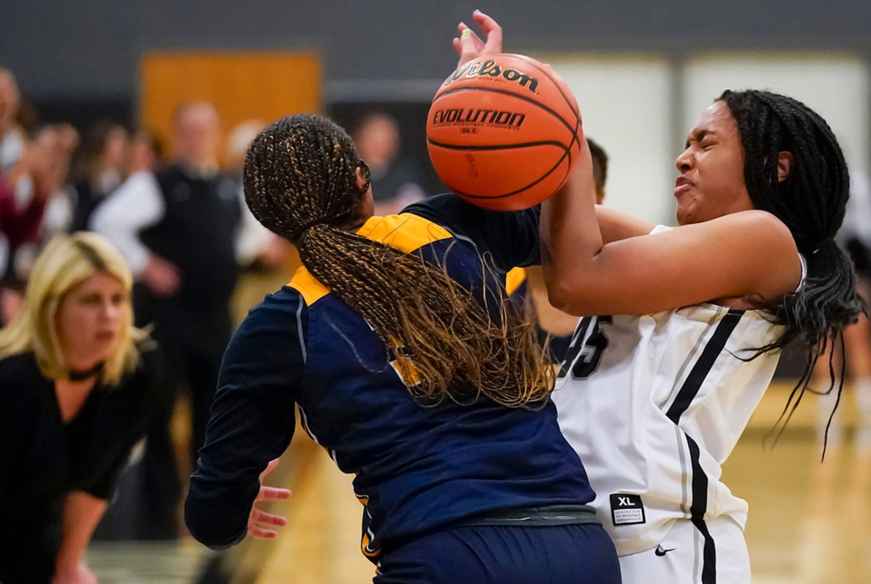 Bishop Lynch Victoria Jordan (45) knocks the ball away from Prestonwood Christian guard...