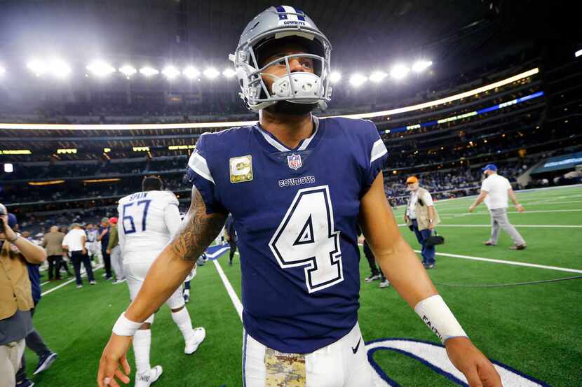 Dallas Cowboys quarterback Dak Prescott (4) walks to the locker room after losing to the...