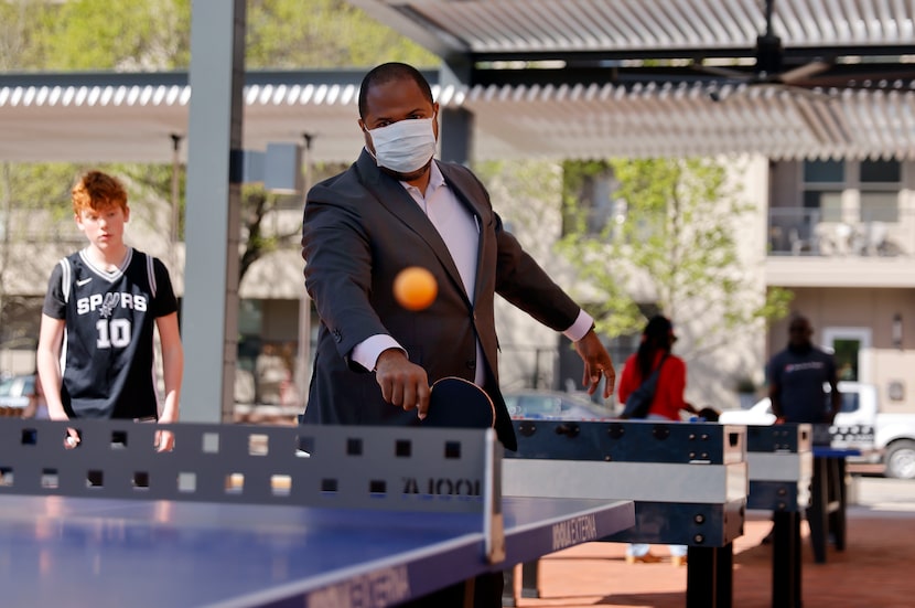 Dallas Mayor Eric Johnson picked up a paddle and got into a competitive match of table...