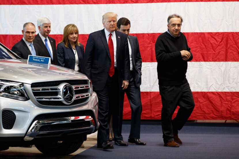 President Donald Trump tours the American Center of Mobility on Wednesday in Ypsilanti...