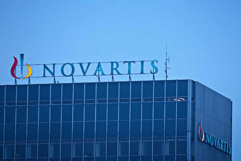 The Novartis AG Logo sits on top of the company's headquarters office in Basel, Switzerland,...