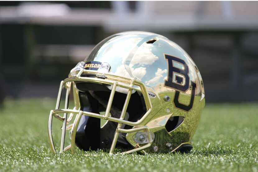 FILE — Baylor University football gold chrome helmet shown Aug. 20, 2013